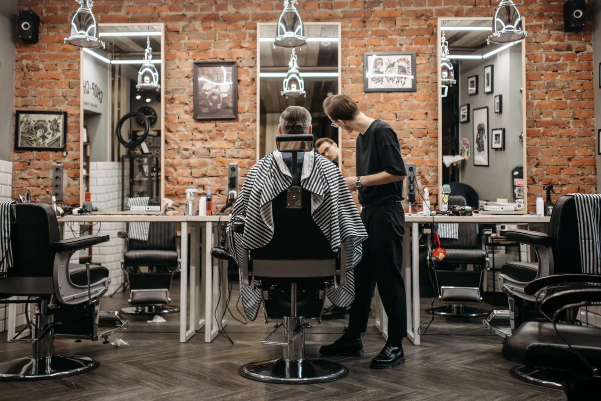Barber chair and mirrors inside a classic barbershop